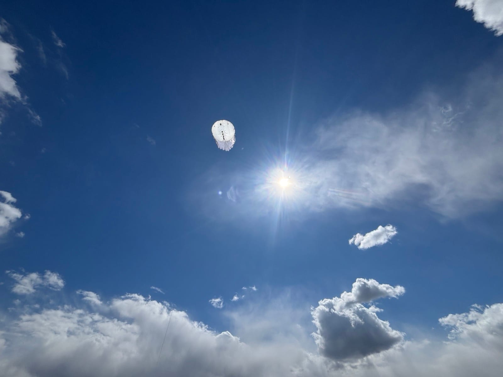 Aerobavovna aerostat at altitude — persistent elevated relay above the clouds